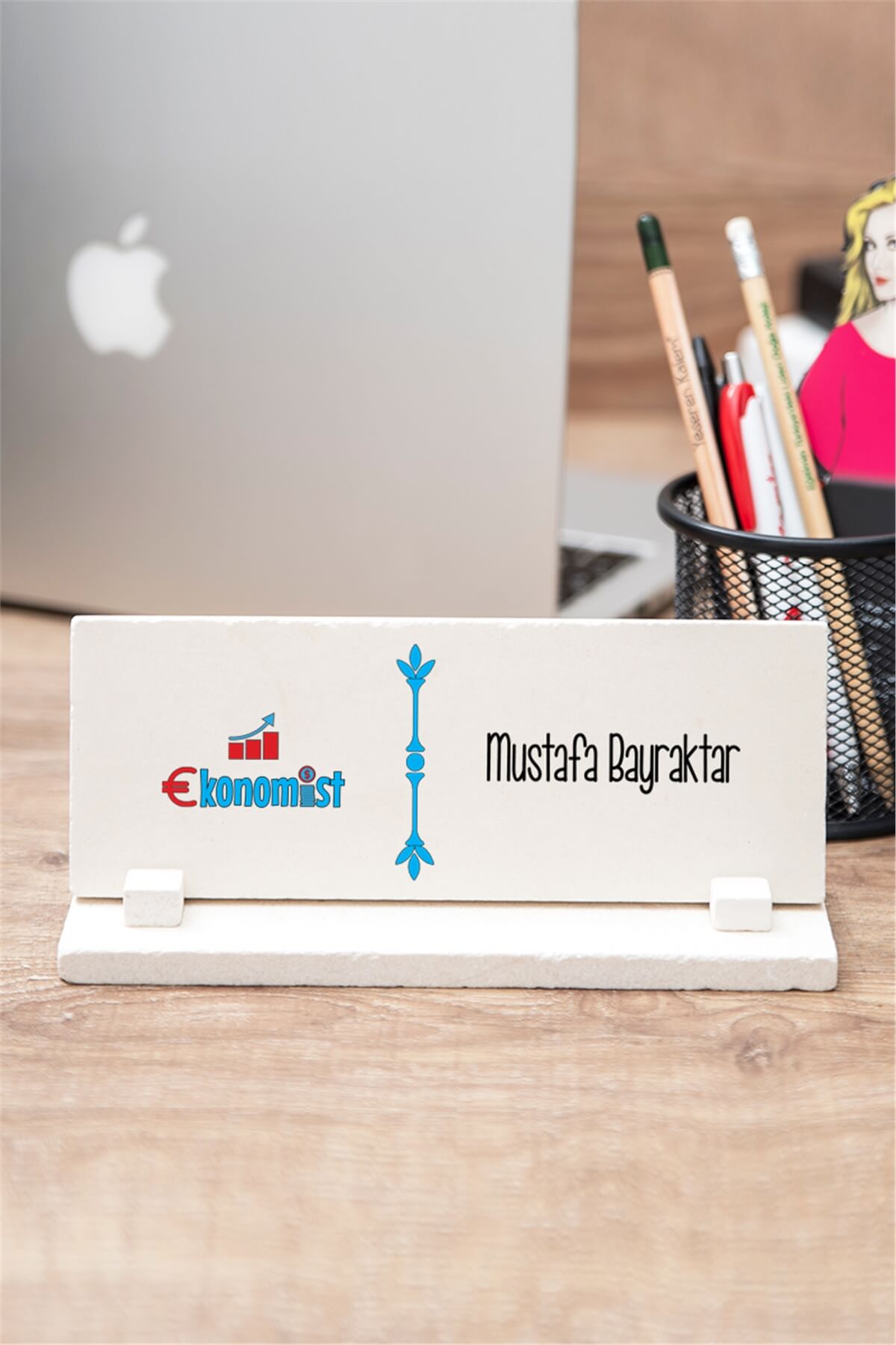 Ekonomist Taş Masa İsimliği